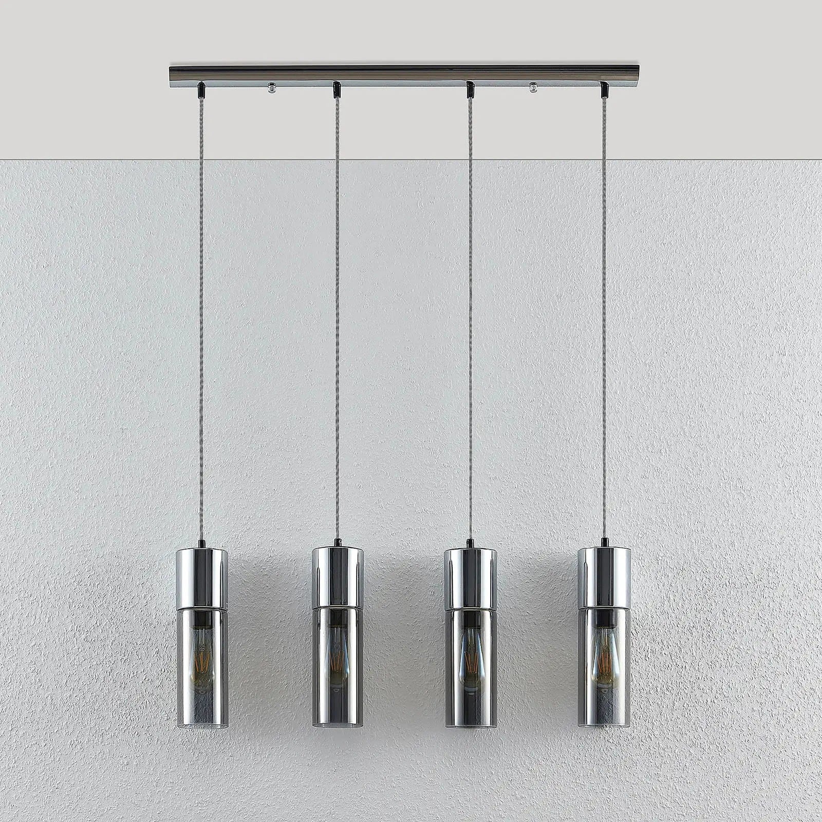 Pakabinamas šviestuvas Eleen su 4 rūkyto stiklo cilindrais