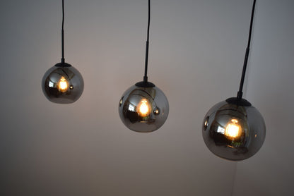 Lindby Sofian pakabinamas šviestuvas, trys šviestuvai, rūkytos pilkos spalvos